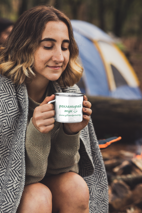 mockup-featuring-a-short-haired-woman-at-a-camping-site-holding-a-12-oz-enamel-mug-with-a-silver-rim-30503