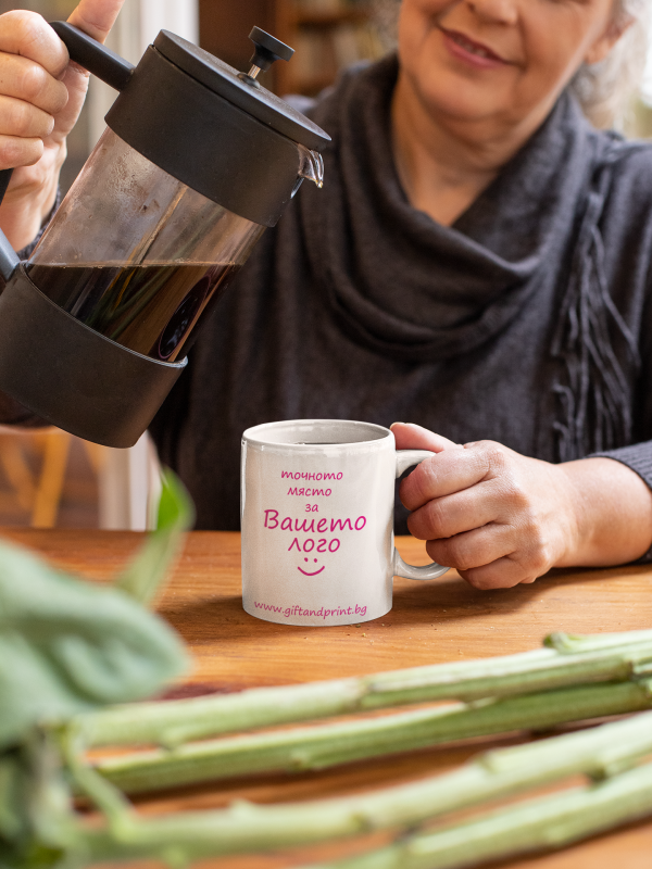 mockup-of-a-woman-pouring-coffee-into-a-mug-at-home-32205