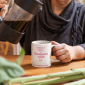 mockup-of-a-woman-pouring-coffee-into-a-mug-at-home-32205